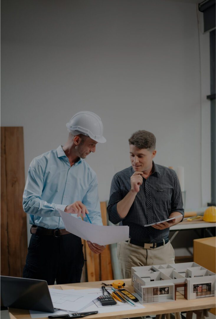 Engineers reviewing project model