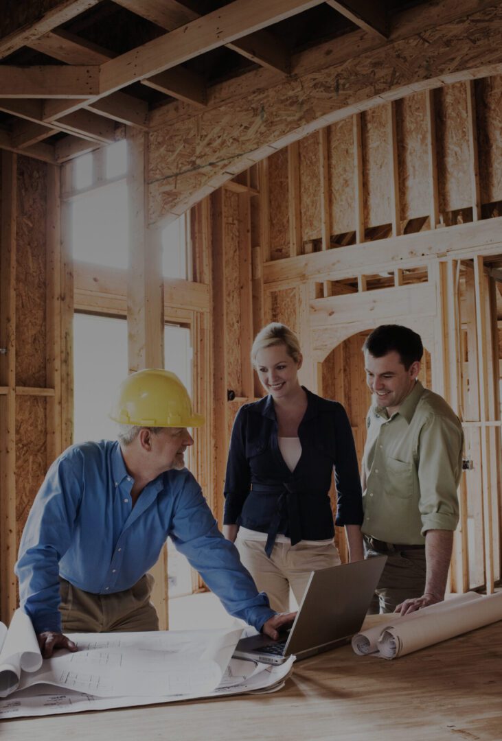 Construction team planning in unfinished building